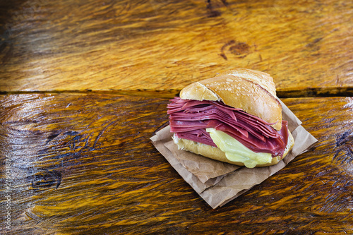 bread with bologna and cheese. Typical Brazilian snack made in the municipal market of the city of São Paulo. photo