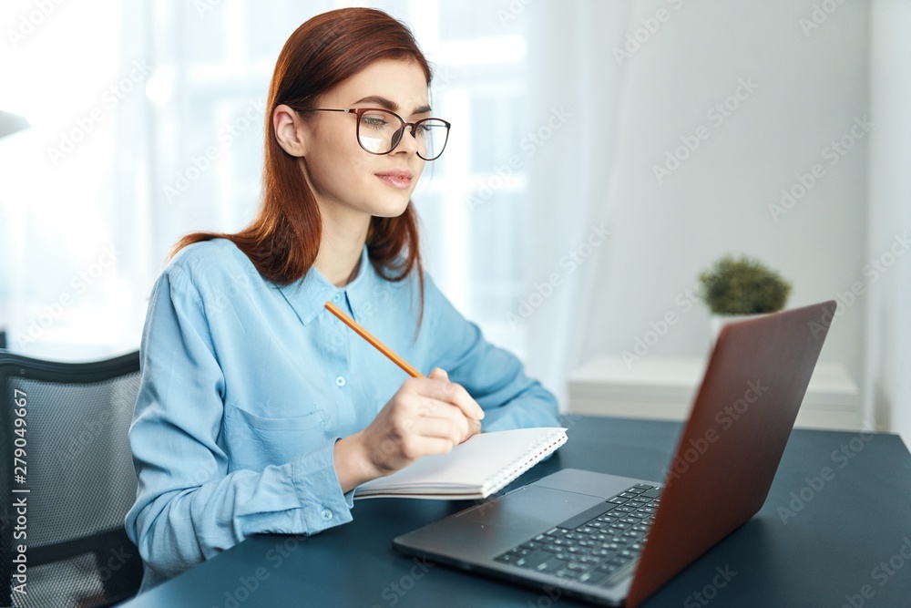 female doctor working on laptop in her office female doctor working on laptop in her office