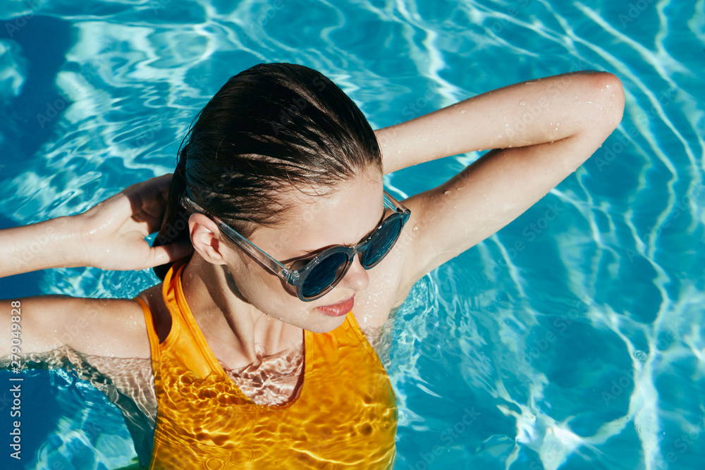 woman in goggles in swimming pool