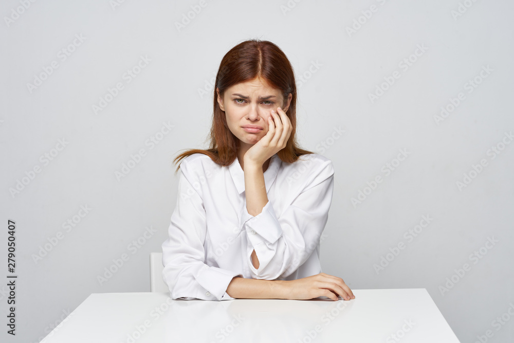 business woman sitting at desk with laptop business woman sitting at desk with laptop