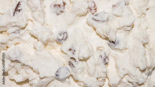 Curd mass with raisins.Background of cottage cheese with raisins. photo