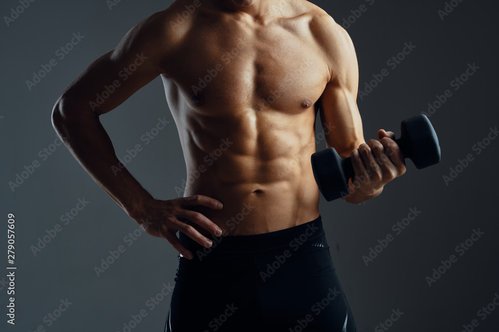 muscular man with dumbbells