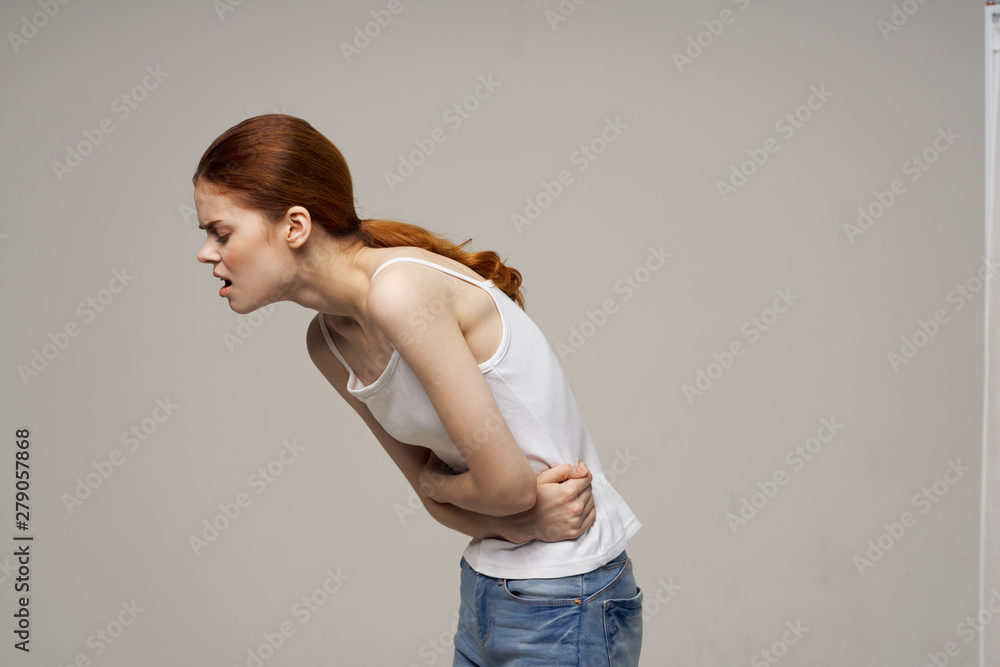 young woman in jeans and white shirt young woman in jeans and white shirt