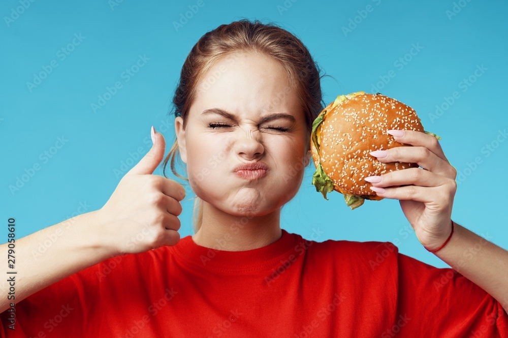 boy with hamburger on white background boy with hamburger on white background