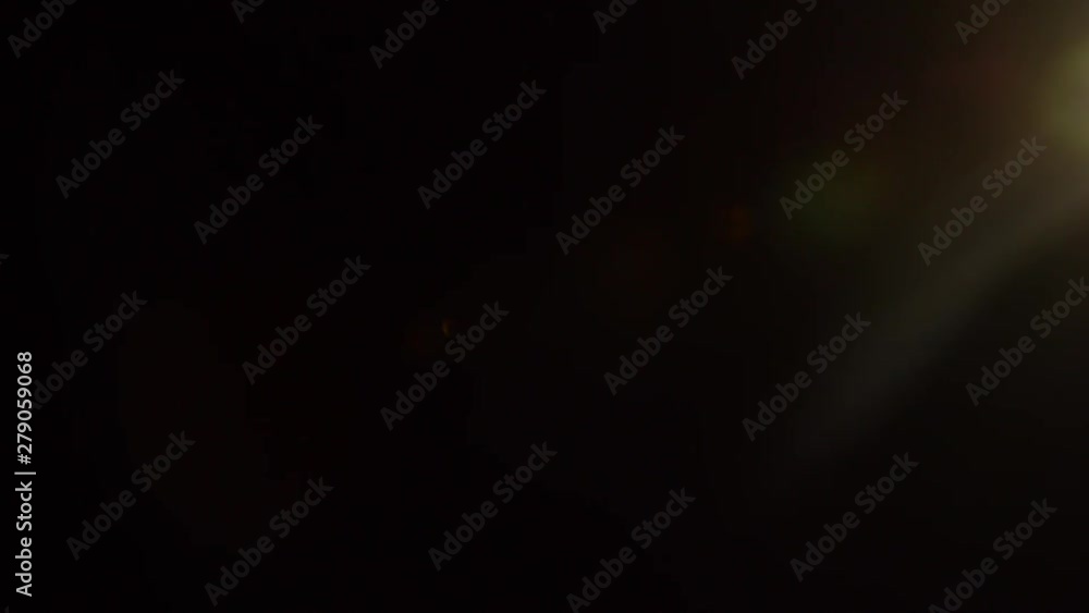 One lens flare light overlays. Sun is outside of side and outside of top of frame. Drop it over your current footage & composite using Add or Screen blend modes.