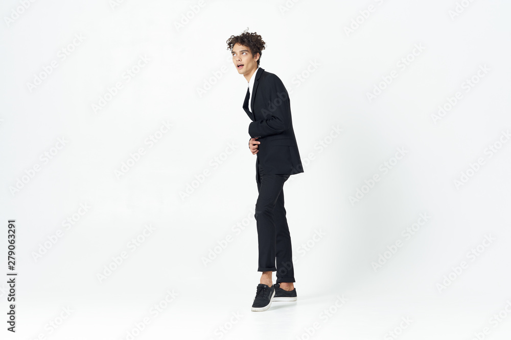 full length portrait of businessman standing with his hands in pockets full length portrait of businessman standing with his hands in pockets