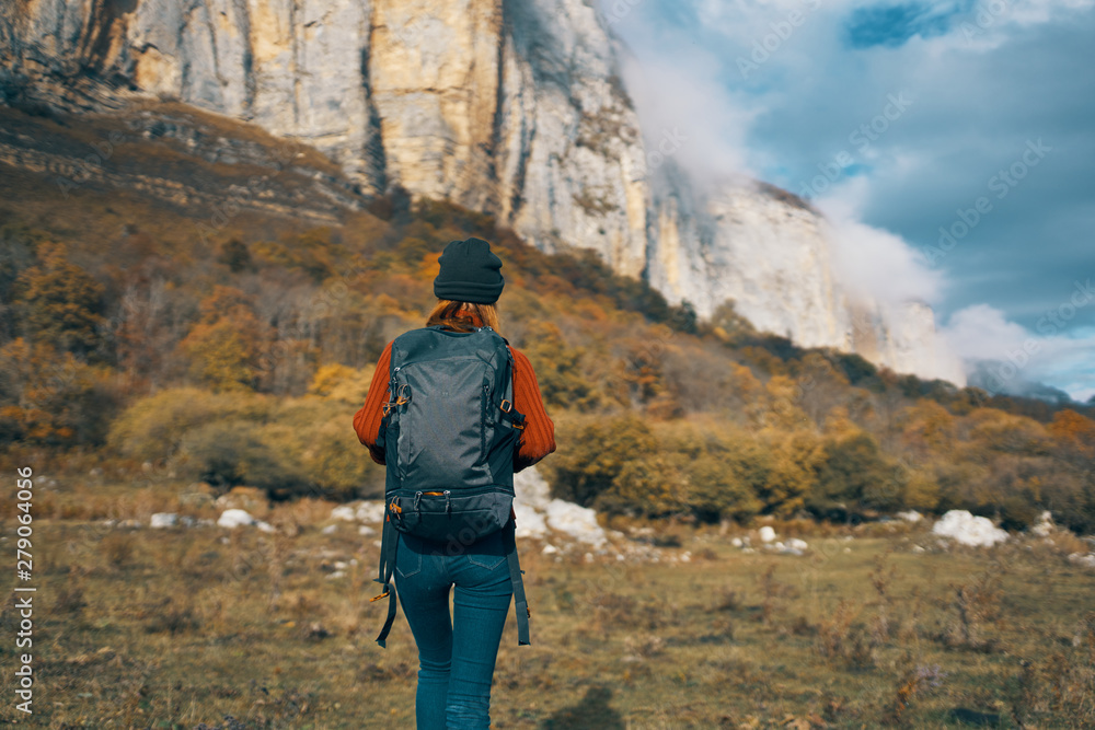 hiker on the top of mountain