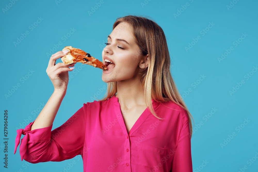 young woman eating cake