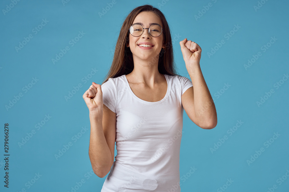 happy woman with arms raised