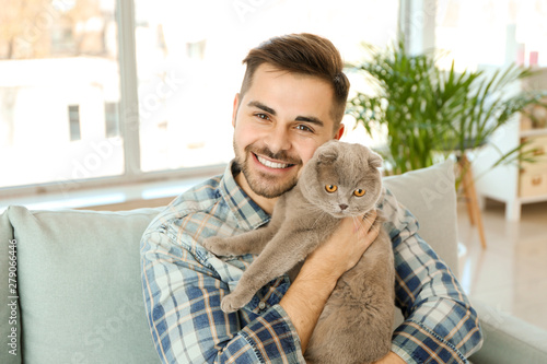 Young man with cute funny c...
