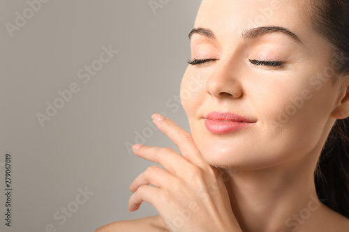 Beautiful young woman with ...