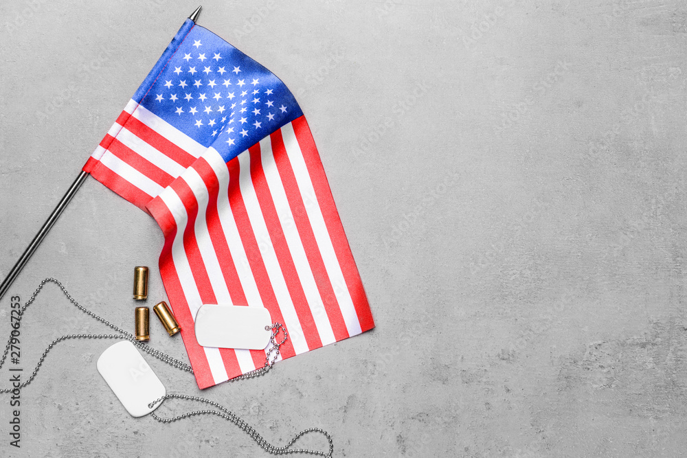 USA flag and military dog tags on grey background Stock Photo | Adobe Stock