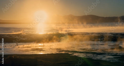 Hot springs early in the morning with the rising sun in the Bolivian Altiplano