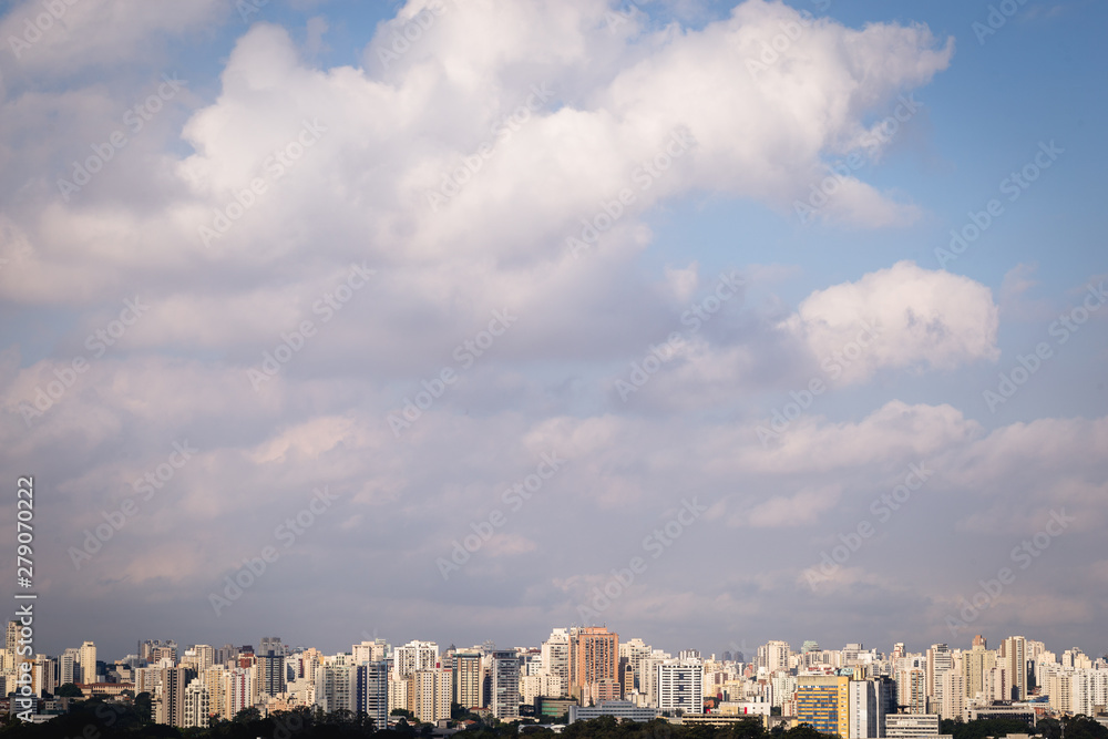 city ​​of são paulo seen from afar. Panoramic image of several buildings with sky in the background.