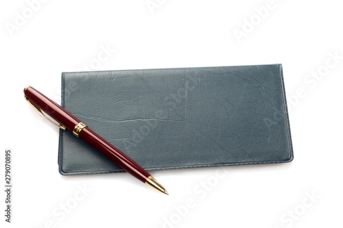 Pen next to a checkbook