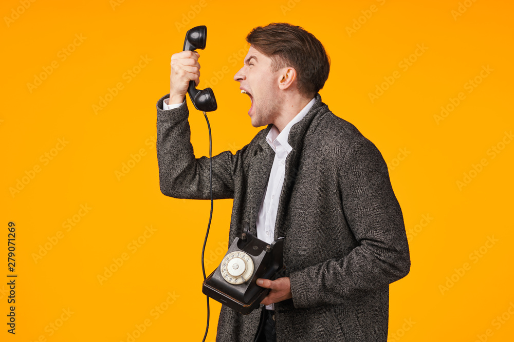 Naklejka premium young man with mobile phone