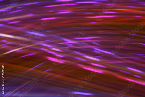 Abstract lines of energy lines of red and blue ectoplasm on a black background.