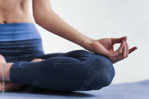 Fototapeta Naklejka Na Ścianę i Meble -  young woman doing yoga