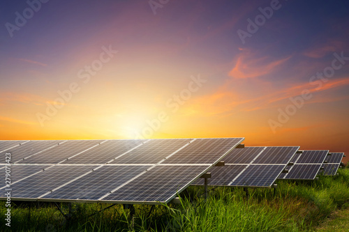 Solar panel on dramatic sunset sky background, Alternative energy concept
