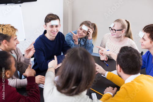 Students playing guess-who game © JackF