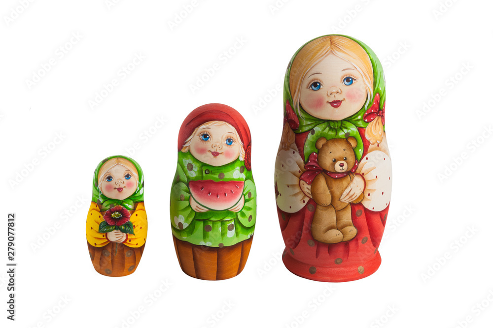 Three Russian nesting dolls on white isolated background