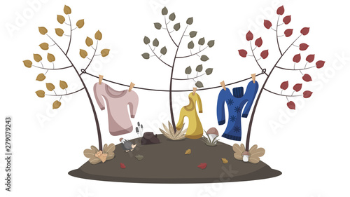 Cartoon meadow with haning sweaters.