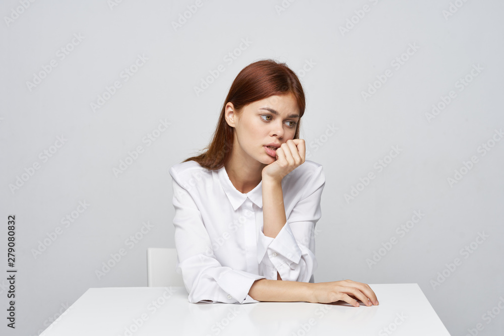 business woman sitting at desk with laptop business woman sitting at desk with laptop
