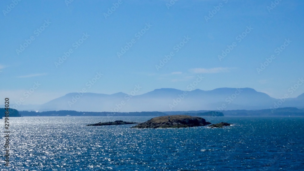 island in the sea and blue sky