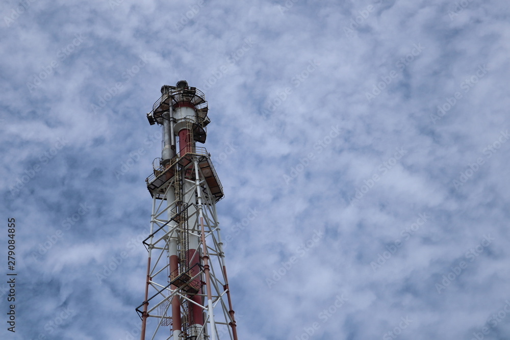 Chimney in the petrochemical industry with sky