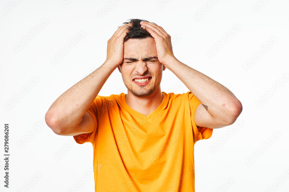 young man with hands on his head isolated on white young man with hands on his head isolated on white