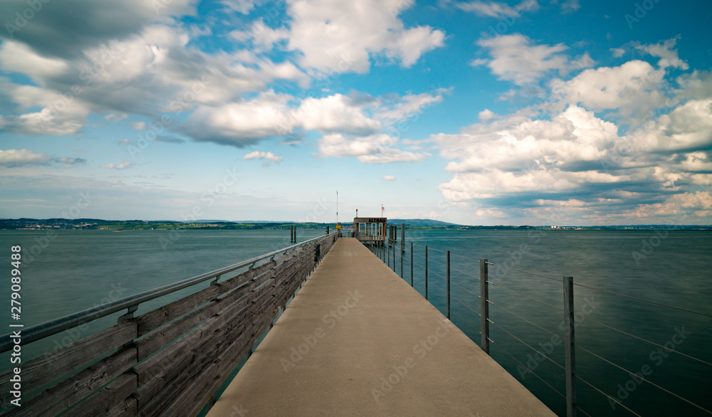 long exposure of the concrete pier in Altnau leading out into Lake Constance