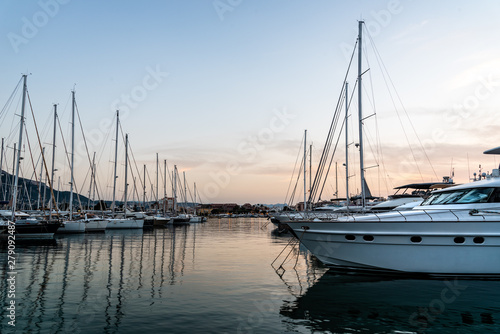 Luxury yachts moored in Marina at sunset