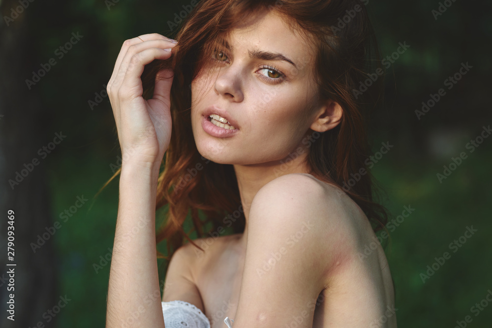 portrait of a beautiful woman with perfect skin looking at camera portrait of a beautiful woman with perfect skin looking at camera