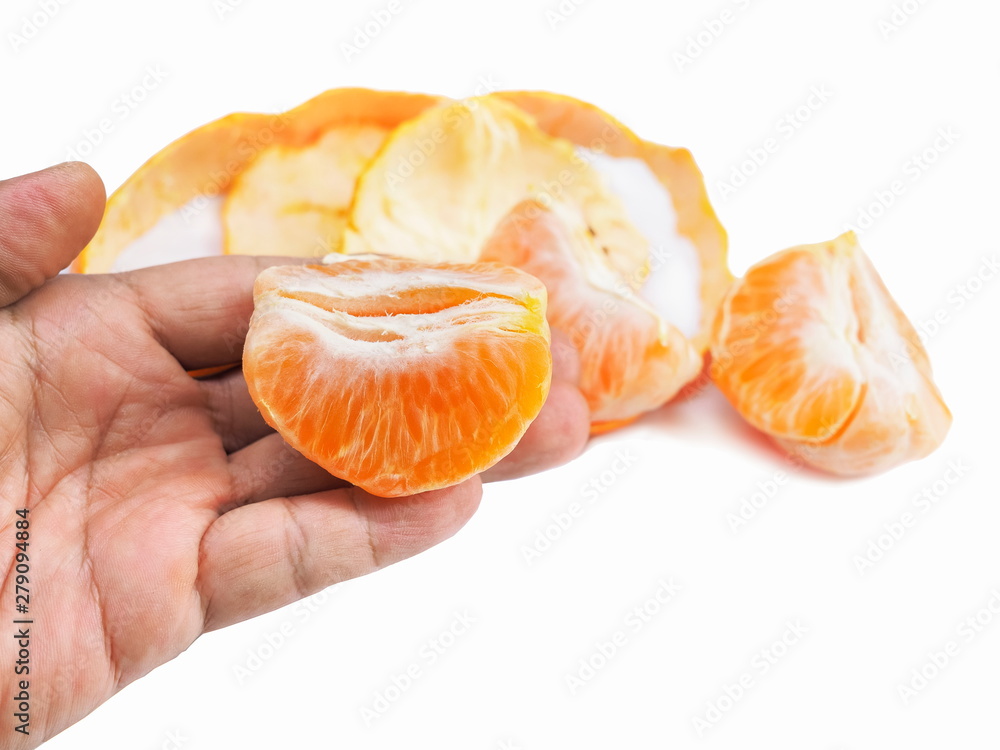 fresh peel ripe orange on hand isolated on white background. fresh peel ripe orange on hand isolated on white background.