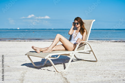 woman relaxing on beach