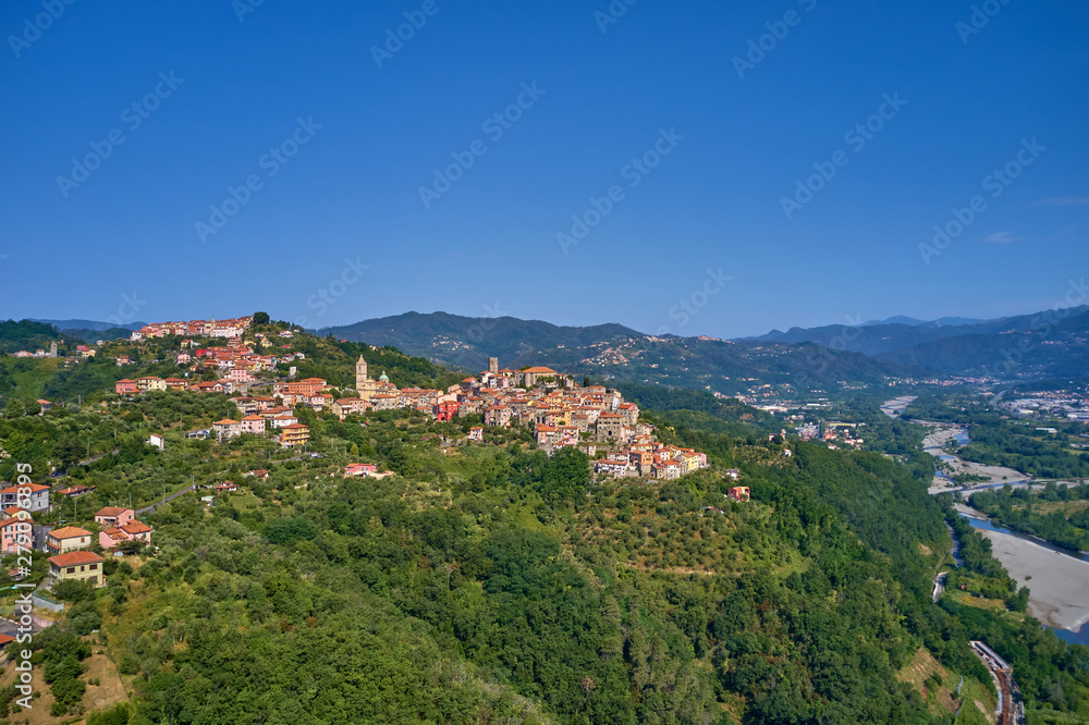 Aerial photography with drone. The ancient Italian town of Bolano Spezia is located on the mountain.