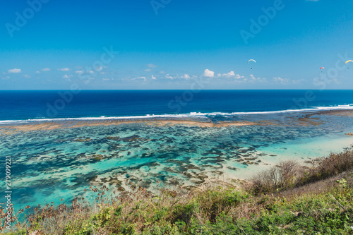 Tropical coast and blue ocean in tropical island.