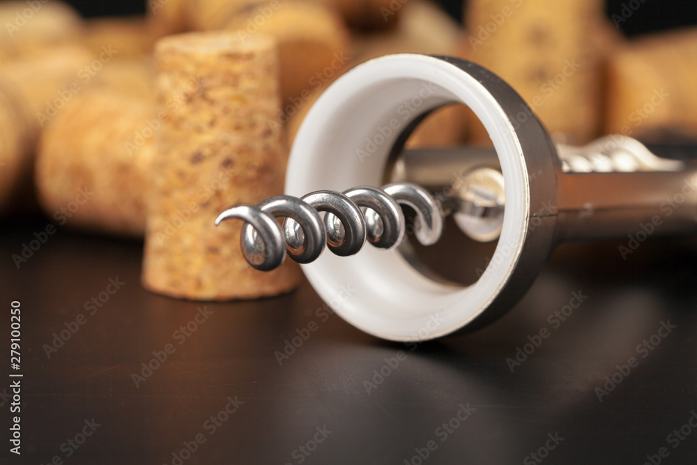 Cork screw for wine and corks close up Cork screw for wine and corks close up
