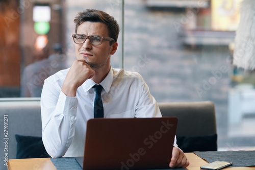 businessman working on his laptop in office