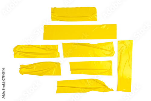 Set of yellow tapes on white background photo