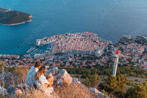 Young couple looking at the city of Dubrovnik in Croatia from Fort Imperial