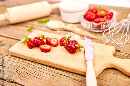 Strawberry on cutting board.  Raw ingredients for cooking strawberry pie © bondarillia