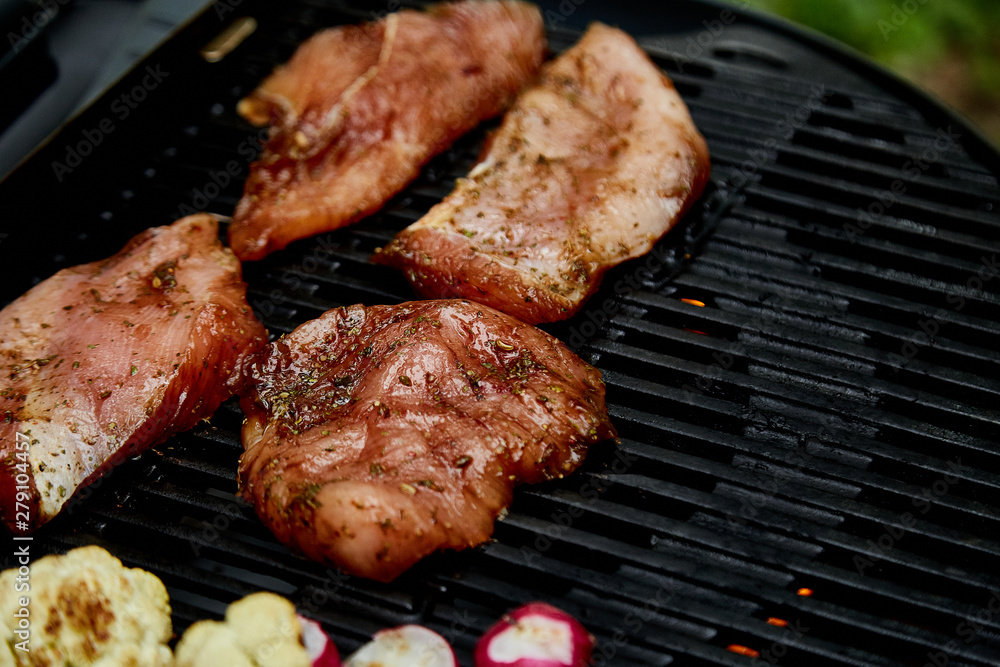 Grilled turkey meat. Steak turkey grill on on huge gas grill . Picnic. Summer. Top view. Flat lay. Copy space.