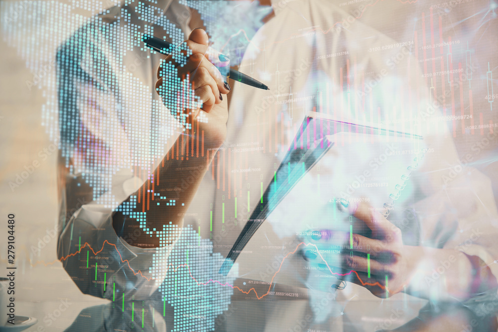 Financial chart drawn over hands taking notes background. Concept of research. Multi exposure Financial chart drawn over hands taking notes background. Concept of research. Multi exposure
