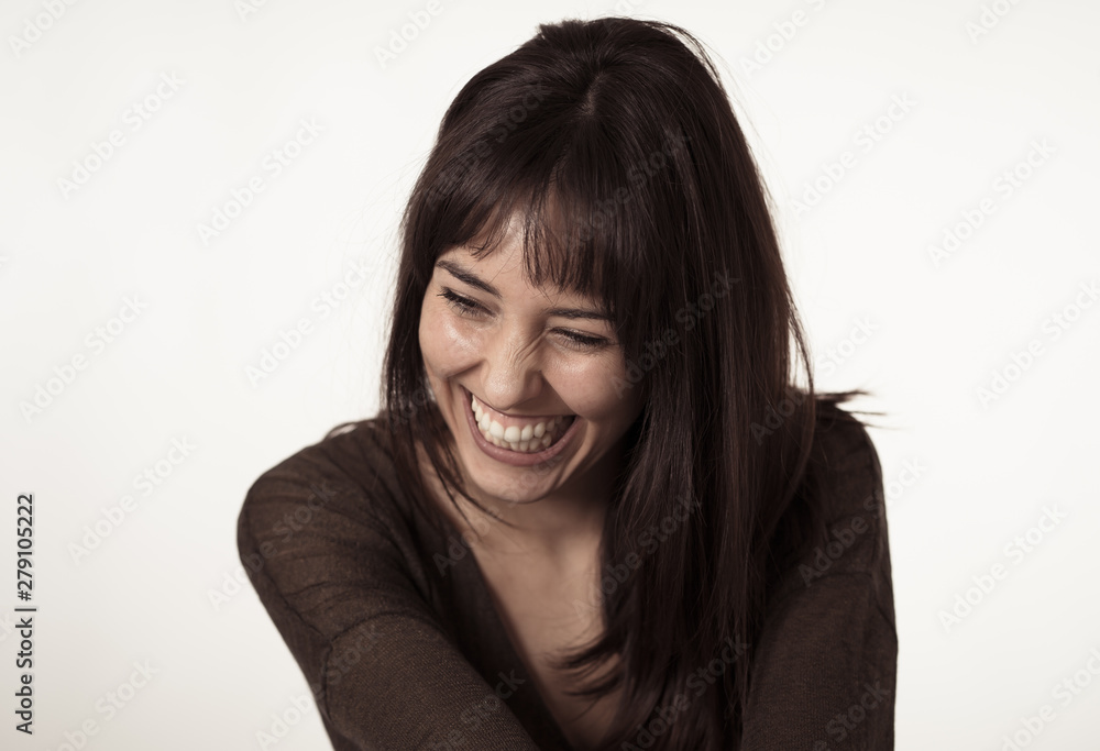 Portrait of young attractive woman with happy and smiling face. Human expressions and emotions Portrait of young attractive woman with happy and smiling face. Human expressions and emotions