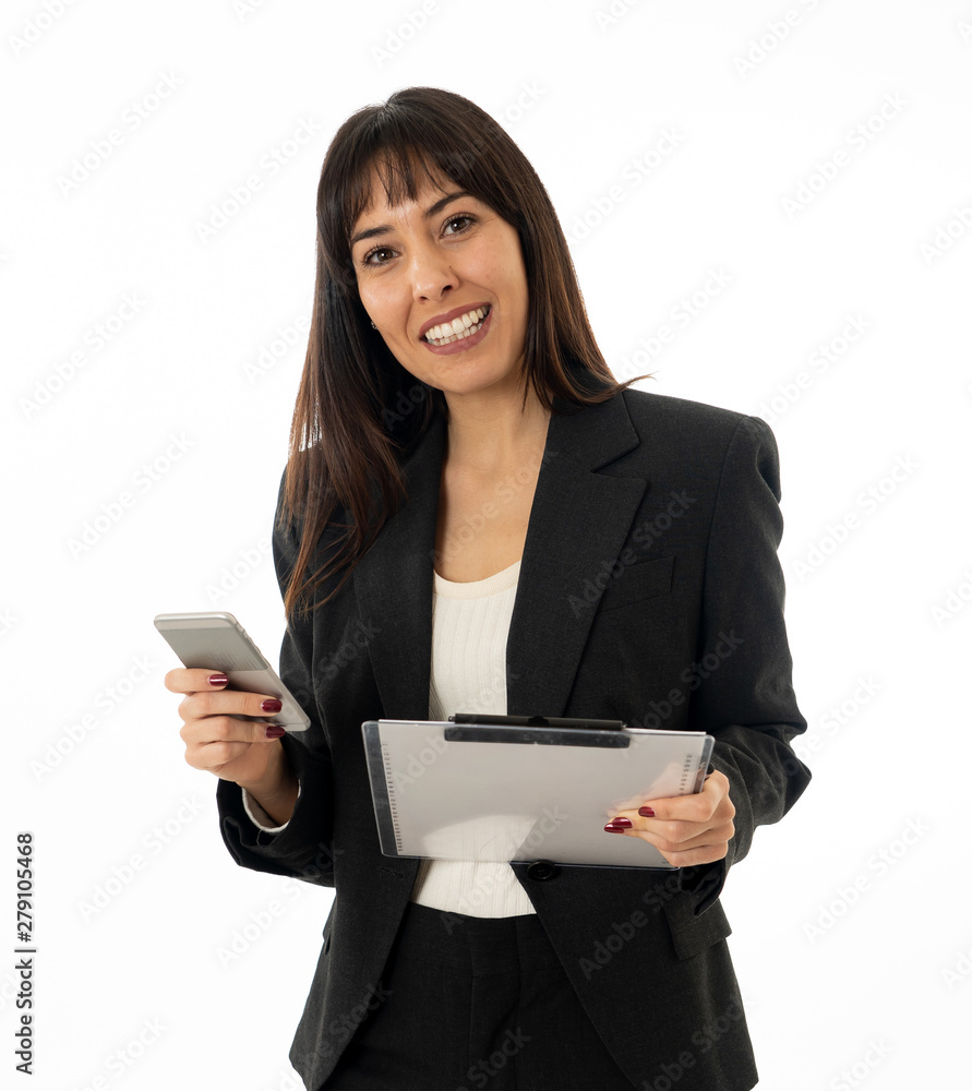 Portrait of a young business woman talking on phone holding a fo Portrait of a young business woman talking on phone holding a fo