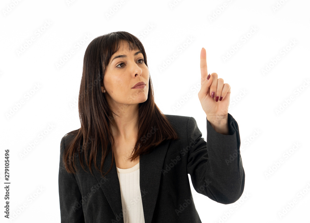 Portrait of a young beautiful and confident business woman pointing. Isolated on white background. Portrait of a young beautiful and confident business woman pointing. Isolated on white background.