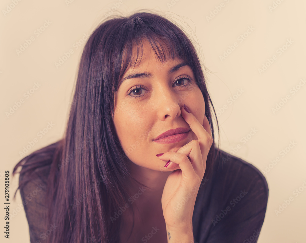 Portrait of young attractive woman with happy and smiling face. Human expressions and emotions Portrait of young attractive woman with happy and smiling face. Human expressions and emotions