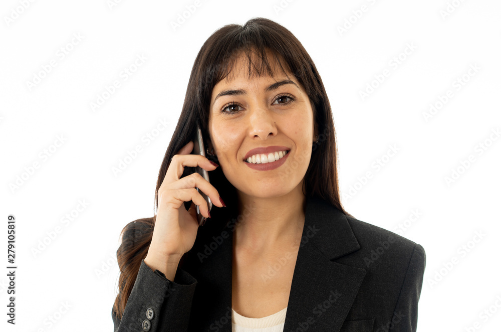Portrait of a young business woman talking on phone holding a fo Portrait of a young business woman talking on phone holding a fo