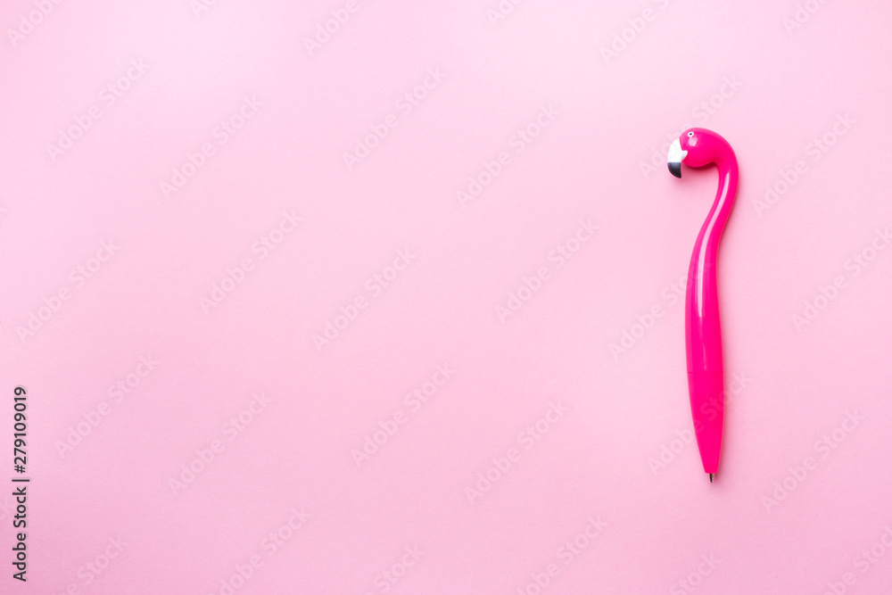 Pink pen Flamingo on a pink background. Copy space Flat lay. Pink pen Flamingo on a pink background. Copy space Flat lay.